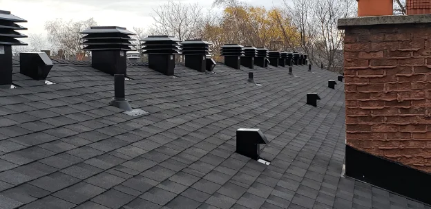 multiple roof vents shown on a typical shingle roof